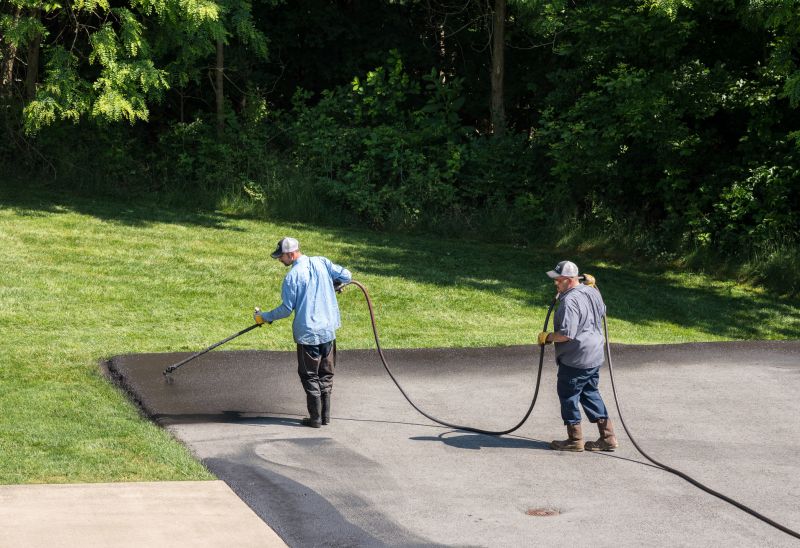 Application of Sealant on Driveway